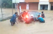 Videos show car swept away, rescue from submerged bus after Kerala rain